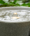 Outdoor Tabletop Water Fountain With LED Lights Made From Recycled Polyethylene Eco Friendly Materials For Patio Porch And Backyard Bubbling Water Feature UV Resistant Durable Yard Decor For All Weather close-up view