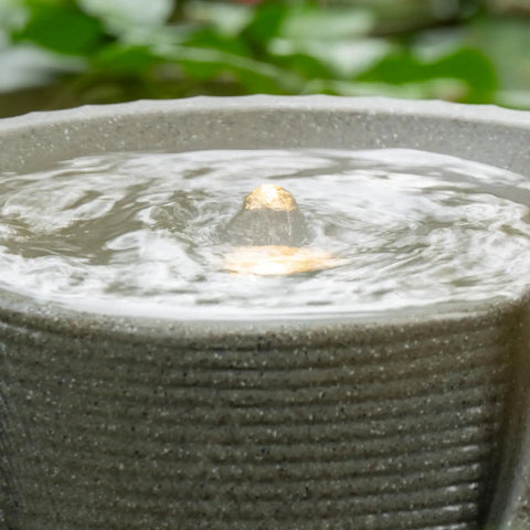 Outdoor Tabletop Water Fountain With LED Lights Made From Recycled Polyethylene Eco Friendly Materials For Patio Porch And Backyard Bubbling Water Feature UV Resistant Durable Yard Decor For All Weather close-up view