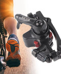 Mechanical Disc Brake Kit With Front And Rear Calipers 160mm Rotors Levers Cables And Hardware next to cyclist foot