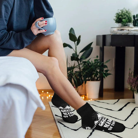 Person relaxing with coffee wearing 5 Pairs Ankle Socks For Running, Gym And RV Camping - Moisture-Wicking, Quick-Dry Athletic Socks
