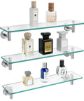 Sturdy 20 Inch Glass Wall Shelves 3 Pack With Rectangular Stainless Steel Brackets In Brushed Finish displaying perfumes.