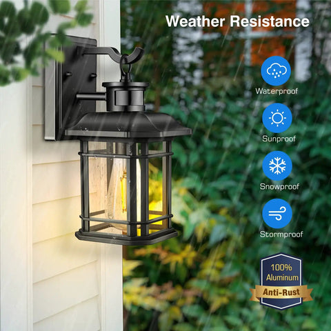 Motion Activated Outdoor Wall Lantern With Dusk To Dawn Sensor In Black Aluminum Anti Rust Finish For Farmhouse Exterior Lighting High Sensitivity Motion Sensor With Three Modes For Garage And Backyard No Fuss, shown on a white wall with weather resistance symbols in corner.