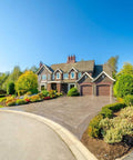 Top Shelf Pro Grade High Gloss Wet Look Concrete Sealer That Really Gonna Make Your Driveway Shine With Hard Hitting Protection And Deep Color Enhancement For A Solid Five Gallon Finish on a decorative driveway.