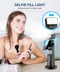 Face Tracking Tripod With 360 Degree Real Time Rotation For Smartphones, black, used with remote control for live streaming, on desk
