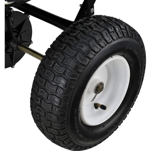 Close-up of the 13 inch pneumatic tire on the Walk Behind Universal Spreader With 100 Lb Capacity For Seed Fertilizer Salt Ice Melt