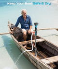 Man using Cordless Stick Water Transfer Pump With Tripod Stand Hands Free in a boat, demonstrating portable electric sump pump use.