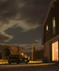 Night scene with barn lit by 300W Equivalent Mini Corn Cob LED Light Bulb With E26 Base 5000K Daylight illuminating the entrance