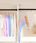 Game Changing Dual Side Closet Hanger With Twelve Rotating Hooks For Organizing Belts Scarves Ties And Gear, displaying shirts and accessories.