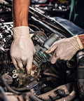 Mechanic installing High Pressure Fuel Pump With Gasket And Bolts For Buick LaCrosse Regal Verano 2.4L Malibu Equinox Captiva