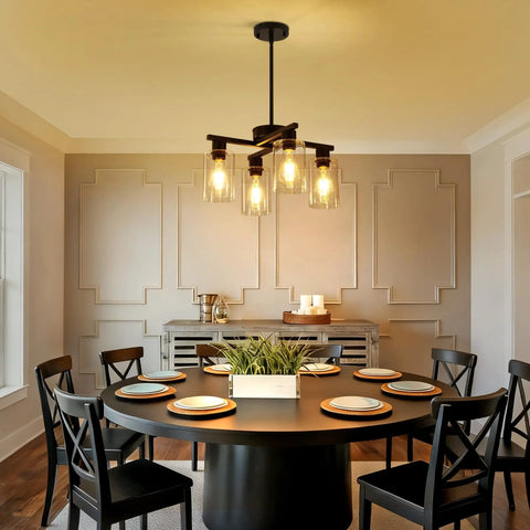 Four Light Black Farmhouse Chandelier With Adjustable Height Pendant Lighting For Dining Rooms above a round dining table with chairs.