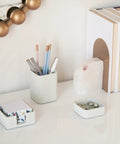 Desk Organizer Set Of 3 For Your Office Made From Sturdy Concrete To Upgrade Any Desk Setup With An Industrial Vibe Includes Pen Holder Paperclip Storage And Sticky Note Holder For Women Or Men on a white desk, holding stationery items.