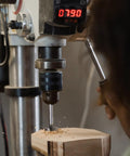Top Tier 21 Piece Forstner Bit Set Made For No Sweat Drilling On Any Project With Carbide Tipped Wood Drill Bits Covering Metric Sizes 10 To 42 Mm round shank in use with drill bit on wood.