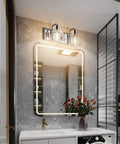 Bathroom with Chrome Vintage Two Light Vanity Fixture With Clear Glass Globe Shades over mirror, sleek industrial design.