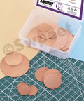 Copper Sheet Kit 18 Pcs in Three Sizes 0.02 Inch Thick Pure Copper Sheets for Crafts DIY Jewelry Electrical Repairs and Industrial Projects Includes 0.75 Inch, 1.2 Inch, and 2 Inch Pieces displayed on a cutting mat and packaging.