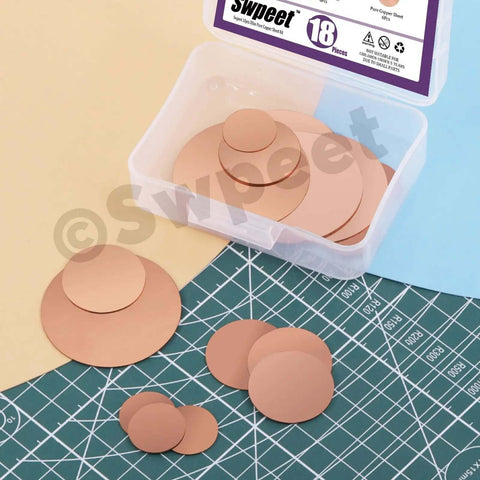 Copper Sheet Kit 18 Pcs in Three Sizes 0.02 Inch Thick Pure Copper Sheets for Crafts DIY Jewelry Electrical Repairs and Industrial Projects Includes 0.75 Inch, 1.2 Inch, and 2 Inch Pieces displayed on a cutting mat and packaging.