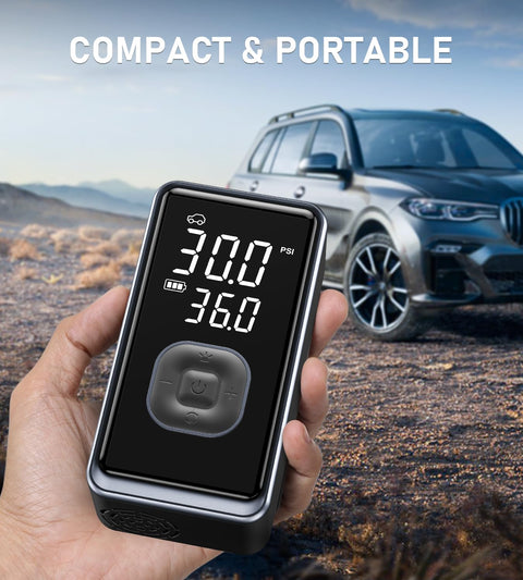 Cordless Portable Tire Inflator Mini Air Pump with Digital Pressure 150 PSI held in hand in front of car