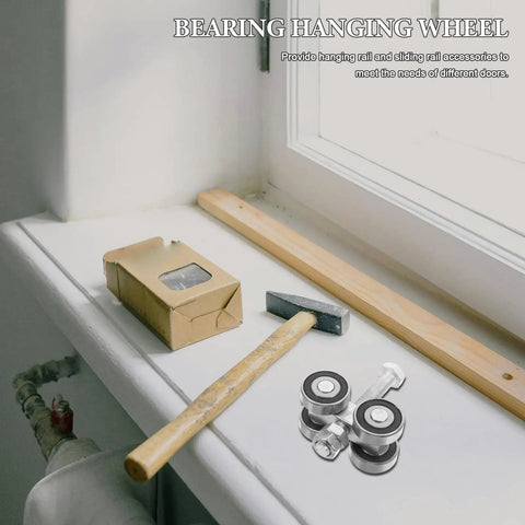 Heavy Duty Dual Bearing Sliding Door Pulley Roller In Tough Matte Black Steel For Butter Smooth Barn And Closet Hardware With Plug And Play V Track Wheel Caster Upgrade on a workstation with tools.