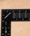 Built Tough 16 X 24 Inch Steel Framing Square Featuring Etched Rafter Tables And Sharp Measurement Lines for precise layouts.