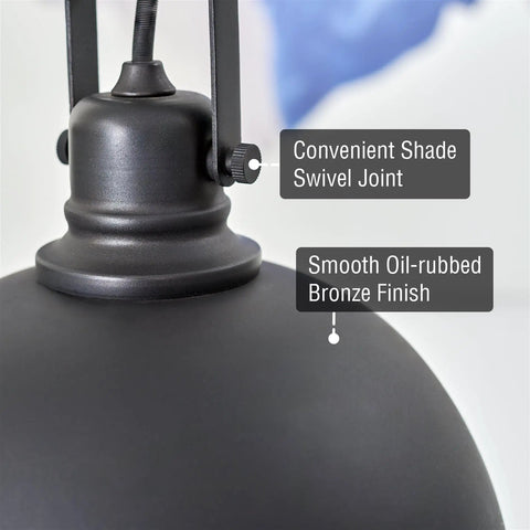 Close-up of Modern Retro Pendant Light with dome shade in oil-rubbed bronze finish, showing swivel joint for sloped ceilings.