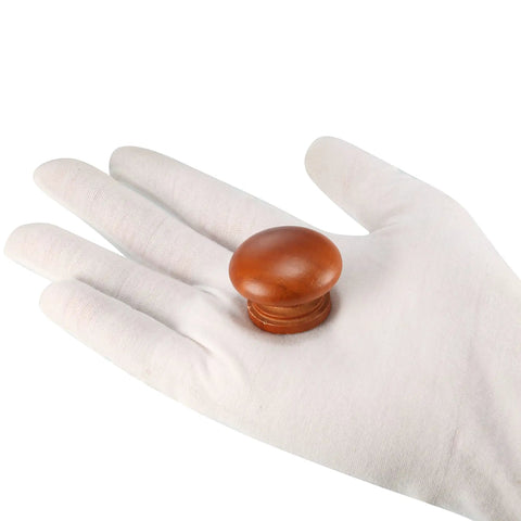 Heavy Duty Round Wood Cabinet Knobs 10 Pack With Matching M4 Screws Matte Brown Drawer Pulls For Modern Kitchen Cupboards Quick Install Vintage Dresser Hardware in hand.