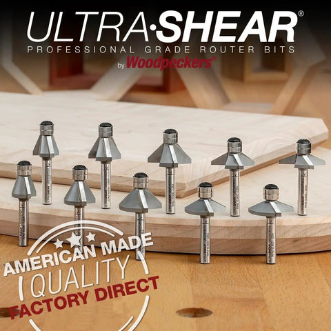 Pro Grade Badass Chamfer Router Bit Five Piece Set With One Quarter Inch Shank And Three Flute Twin Pilot Bearing Carbide Tips For Sleek Edge Forming And Sweet Bevel Cutting Angles Made In Usa on a wooden surface.