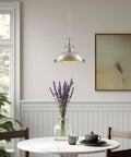 Industrial Farmhouse Nautical Pendant Light With Round Fresnel Lens, adjustable height, hanging over dining area table, oil rubbed bronze finish