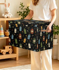 Top Shelf Storage Chest With Lid Holds Massive 85 Liter Load sturdy toy box, fabric storage cube carried by a woman.