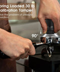 Person using 54mm Espresso Accessories Kit With Spring Loaded Calibrated Tamper WDT Tool And Dosing Funnel For Breville 54mm Machines