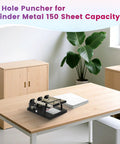 Heavy Duty Three Hole Punch With Labor Saving Handle Punches Up To 150 Sheets In A Single Pass on office table