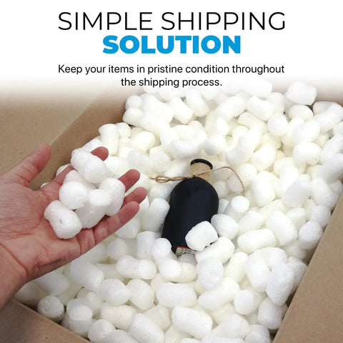 Open box with hand holding biodegradable packing peanuts 0.25 cu ft antistatic, compostable white popcorn packaging cornstarch blend