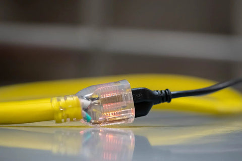 Extra Heavy Duty 25 Ft Extension Cord 10 Gauge 3 Conductor Outdoor Cable with Lighted End SJTW yellow vinyl close-up