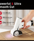 SEEKNEW Cordless Electric Scissors With LED Display cutting cardboard, lightweight 396g, showing front LED light usage.