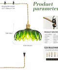 Super Easy Install Green Glass Plug In Pendant Light with adjustable cord, dark green glass shade and brass fittings.