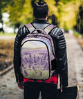 Person wearing Purple Flower Valley Printed Unisex Backpack With Large Capacity Durable Polyester Daypack outdoors