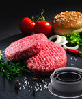 3 In 1 Hamburger Press With Nonstick Patty Mold, raw patties, buns, tomatoes, onions, and herbs for grilling and barbecue mastery.