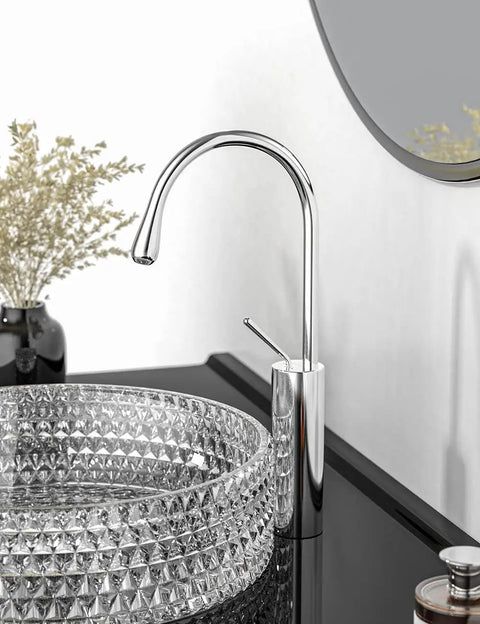 Vessel Sink Chrome Faucet With Single Hole Slick Modern Single Handle Lavatory Faucet Water Drop Faucet Solid Brass Ceramic Cartridge Easy Install Bathroom Faucet FW-FA105 installed on black countertop with crystal sink