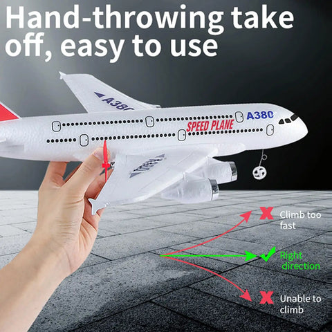 Hand launching Ready To Fly A380 RC Airplane With 6 Axis Gyro Stabilizer, showing correct takeoff angle on textured surface.