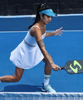 Player using G3 Powerband Pickleball Paddle With 16mm Core, Carbon Fiber Face, on a blue pickleball court, in action.