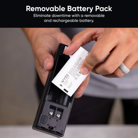 Person inserting battery into Wireless Duo Cam Video Doorbell With Chime Included, Battery Powered, 2K Full HD Video, Dual Cameras