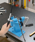 Person using blue Chainsaw Chain Breaker And Rivet Link Breaker Benchtop Tool 2 In One Chain Saw Link Breaker on workbench