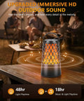 Outdoor Bluetooth Speaker Set With Flame Ambience LEDs Waterproof IPX6 Bluetooth 5.3 Auto Pairing Multi Sync Up To 100 Speakers 10W 3D Surround Sound Portable Party Speaker For Patio Deck Porch Backyard RV The Kickass Gift For Him on wooden table.