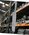 Expandable Plastic Card Holder And Multi Grid Desk Organizer in a warehouse setting with metal gears in the background.