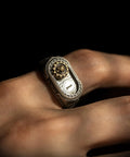 Straight Up Premium Warhammer 40K Adeptus Mechanicus Cipher Of The Machine God Ring For Men on hand, showing gold and silver detail.
