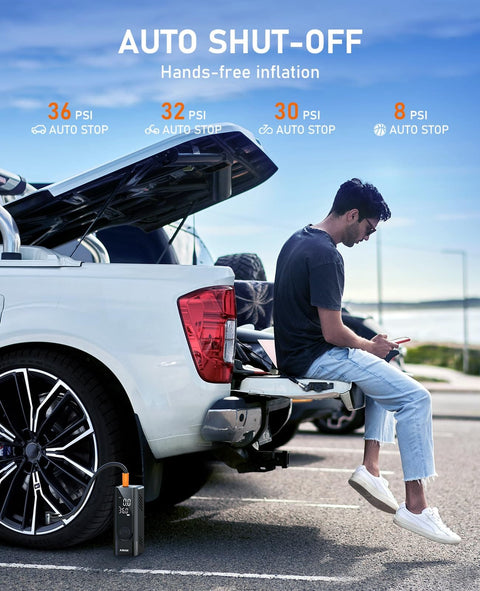 Person using Portable Tire Inflator And Air Compressor With Dual Power Battery And 12V DC Car Bike Motorcycle Pump 150 PSI Cordless