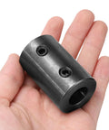 Rigid Shaft Coupling Five Eighths Inch Bore And One And A Quarter Inch Outer Diameter Two Inch Length Black Oxide Plated Steel Motor Wheel Coupler With Two Set Screws For Rock Solid Torque Transmission In Small Machines, hand-held view
