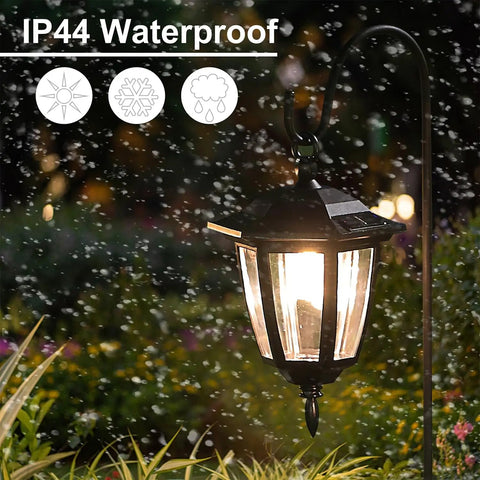 Solar Hanging Lights For Outdoors, 2 Pack With 38 Inch Shepherd Hooks, Waterproof Garden Lanterns glowing in rainy garden