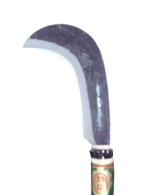 Close-up of Heavy Duty Garden Sickle With 6.3 Oz Blade And 14.2 Inch Oak Handle Cob Pattern Cover Included Ideal For Fast Branch Pruning And Yard Cleanup Lightweight Yet Tough Japanese Craft For Accurate Cuts.