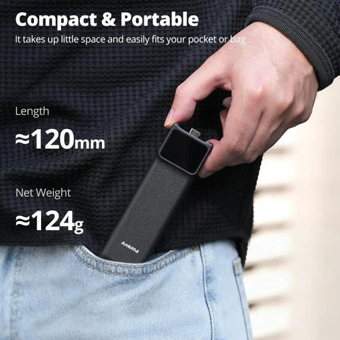 Power Bank Grip For Pocket 3 And Pocket 4 Camera With 5000 mAh Battery LED Display shown in pocket for size reference