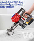 Person using DW20V6 Vacuum Adapter For Dyson V6 Series And DeWalt 20V Battery with cordless vacuum on white couch.