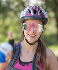 Woman wearing Unisex Sports Sunglasses For Men Women And Teens With UV400 Protection Wraparound Wide View One Piece Frame